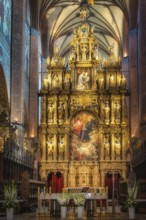 Closeup on amazing, golden and ornate altar of Church of the Assumption of the Blessed Virgin Mary,