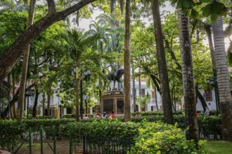 Bolivar Square with trees and statue in, Old Town Cartagena, Colombia