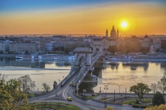 Budapest Hungary, city skyline sunrise at Danube River with Chain Bridge and St. Stephen's Basilica