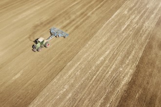Aerial view Tractor preparing field, Agriculture tractor landscape