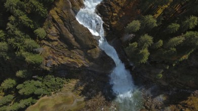 Aerial view of Krimml Waterfalls on sunny day. High Tauern National Park, Austrian Alps, Austria