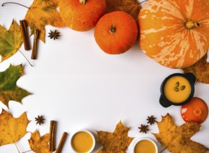 Autumn food. Frame of pumpkin puree soup, leaves. Top view. Autumn harvest, pumpkins, leaves on