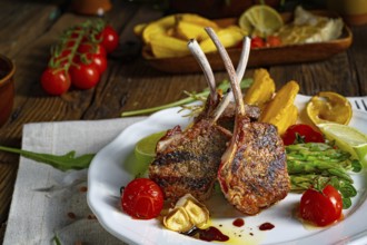 Lamb shanks marinated in herbs with green asparagus and lime