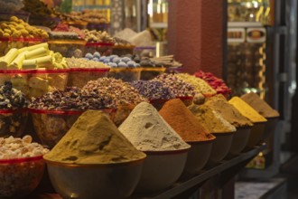 A picture of colorful spices on a store at the Dubai Spice Souk