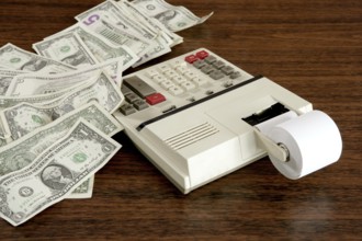 Dollar notes calculator accountant office vintage retro wooden table
