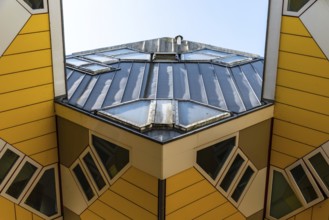 Rotterdam, Netherlands, May 8, 2022: Yellow cubic houses in Rotterdam. The Cubic Houses were