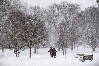 Heavy snow squalls of lake-effect snow falls over Springbank Park in London, Canada. Environment