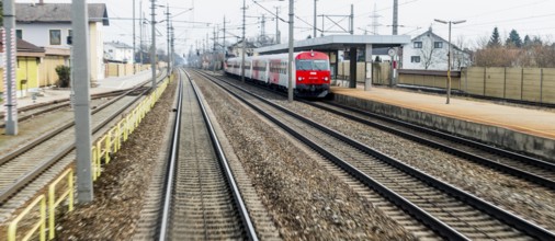 Austria, Upper Austria, Linz, Wels . Railway tracks seen from a moving train between Linz and Wels