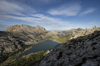 Trekkers on the crest of the Puig de Rateta with the Puig Major in the background, Escorca,
