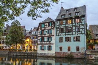 Historic houses on the embankment of the Ill river in Petite France district in Strasbourg, France.