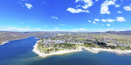 The view over the town of Jindabyne and Lake Jindabyne on a warm sunny summer's day in New South
