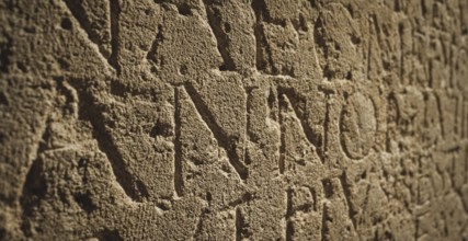 Roman inscription in stone in bath, united kingdom england