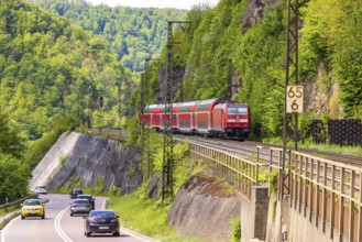 Regional express RE5 en route on the winding railway line of the Geislinger Steige. Landscape along