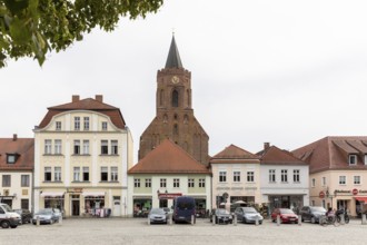 East side of the market square, behind it the town church St.Marien, old town of Beeskow,