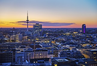 City view from above with the Heinrich Hertz Tower at atmospheric sunset, Hamburg, Germany