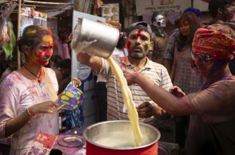 A person selling bhang lassi on a street, during the holi festival, the Hindu spring festival of