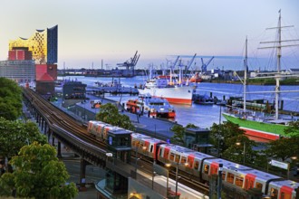 View of Hamburg harbour with museum ship Cap San Diego, elevated railway along the Elbe promenade