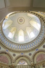 View of the ornately painted interior ceiling with detailed patterns and windows, Mosque,