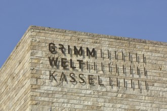 Building of Grimmwelt Museum with inscription, Grimm, world, Brothers Grimm, roof, corner of house,