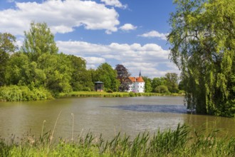 Castle park with castle pond, pavilion and moated castle Fürstlich Drehna, Luckau, Brandenburg,