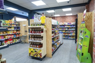 A modern supermarket with various products and decoration, Tante M, self-service shop,