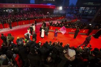 Guests on the red carpet at the opening film The Light of the 75th Berlinale at the Theater am