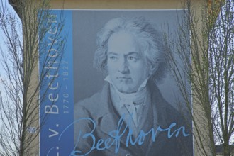 Portrait of the composer Ludwig van Beethoven on a block of flats with signature and year,