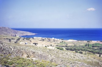Countryside landscape view over fields to coastline at Kato Zakros, Crete, Greece, Europe 1972