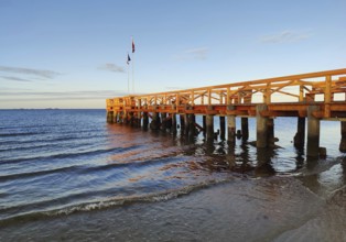 New south beach bridge at atmospheric sunrise with a view of Amrum, Südstrand, Wyk auf Föhr, North