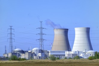 Cooling towers of the Doel Nuclear Power Station, nuclear power plant and high-voltage electricity