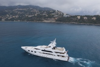Aerial view 51 metre motor yacht ELENI cruising between Cap Martin and the Principality of Monaco,