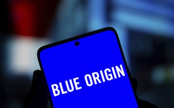 Blue origin logo is displayed on smartphone. Blue Origin Enterprises is an American space