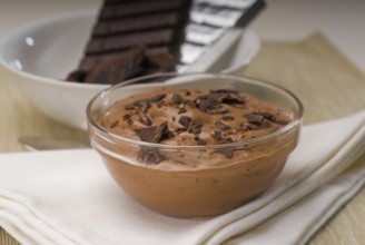 Fresh homemade chocolate mousse made with bitter chocolate, closeup