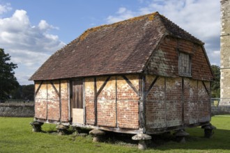 MIDHURST, WEST SUSSEX/UK - SEPTEMBER 1 : View of the Cowdray Castle medieval granary set on