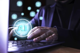 Close up of a man using a computer with artificial intelligence icons. use of artificial