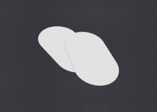 Two white ovals slightly overlapping on a gray background, minimalistic abstract design, Blank