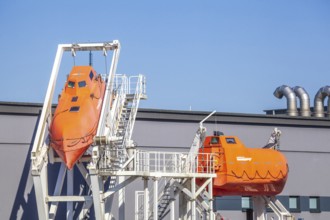 Orange lifeboats on a ship, Bremerhaven, Bremen, Germany