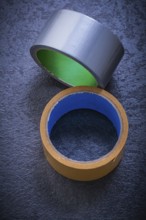 Adhesive tape on black background Construction concept
