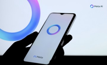 Meta AI logo on smartphone for Facebook Artificial Intelligence.