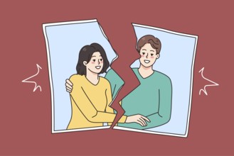 Torn picture of smiling couple show end of romantic relationship. Concept of breakup and divorce.