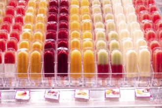 Several rows of ice lollies, Mercat de la Boqueria, famous market on the Ramblas in Barcelona,