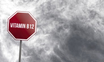 Vitamin B12, red sign with clouds in background