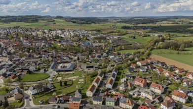 Panorama of a town and surrounding green landscape under a cloudy sky, Mitterteich, Upper