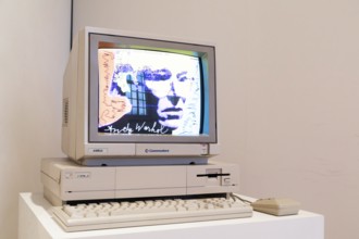 Venaria Reale, Italy, October 2022: Computer Commodore Amiga 1000 with floppy disk, mouse, beige