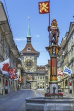 Zahringerbrunnen fountain and Zytglogge tower in Bern city centre, Switzerland