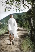 Mahatma Gandhi walking with stick, India, 1937