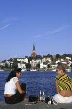 Two girls at the harbour of Flensburg, Schleswig-Holstein, Germany