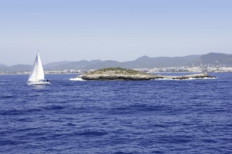 Ibiza mediterranean island blue seascape with rocks