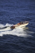 Aerial view sports boat J Craft 42 Torpedo R at full speed on the Cote d'Azur, luxurious motorboat