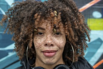 Close up portrait of woman with freckles